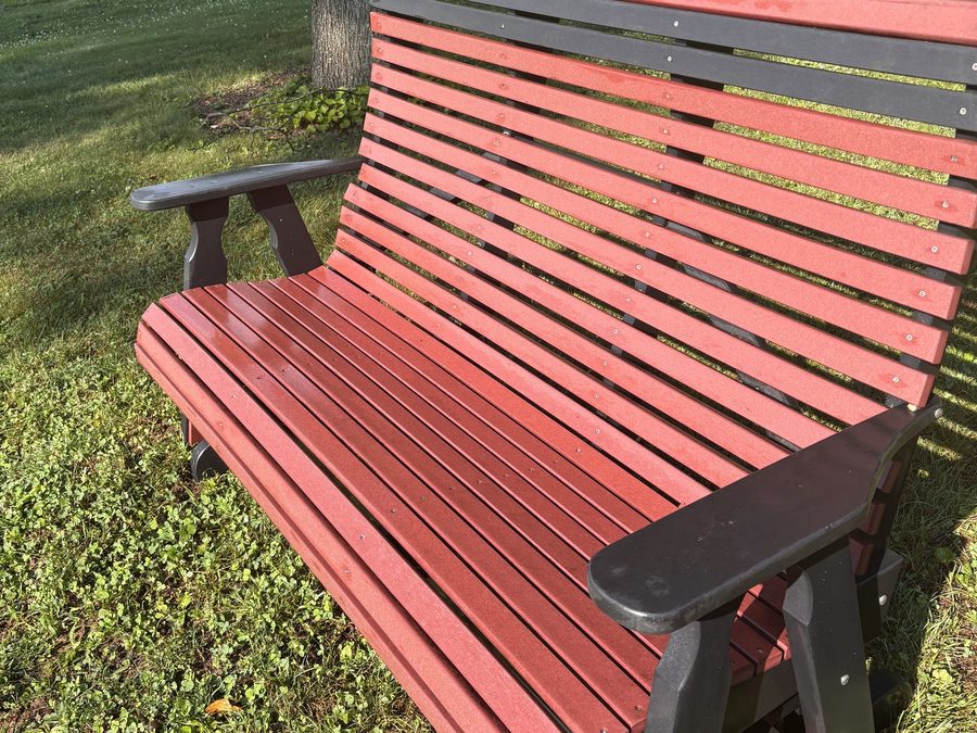 The same poly bench after cleaning, with the deep red color restored